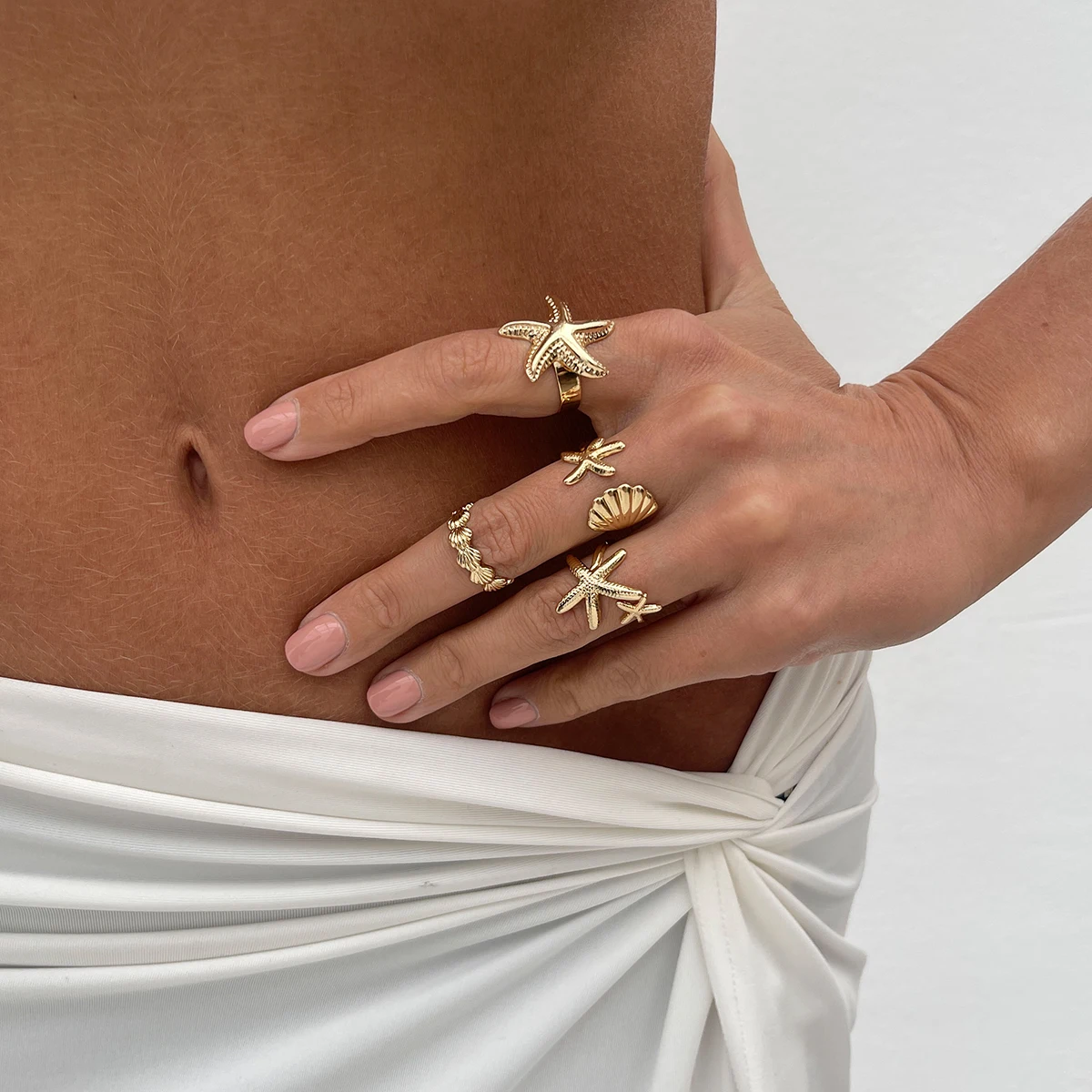 SHIXIN-Anillos abiertos ajustables con forma de estrella de mar para mujer, sortija geométrica de Color dorado, accesorio de joyería de playa de verano, 4 unidades por juego