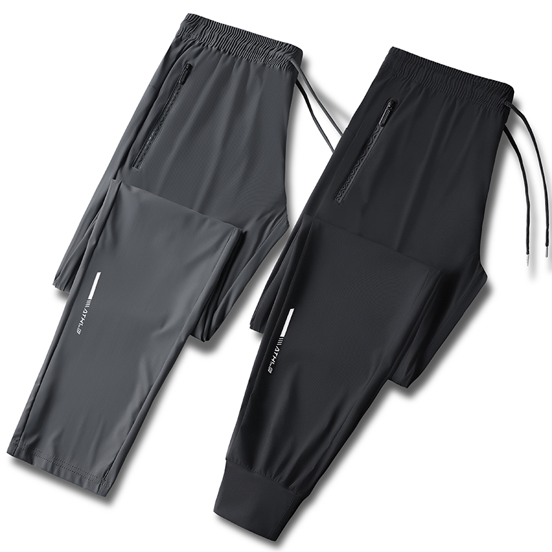 Pantaloni da uomo in tinta unita estivi in seta di ghiaccio elastici ad asciugatura rapida pantaloni sportivi larghi adatti per abbigliamento casual e da lavoro M-8XL