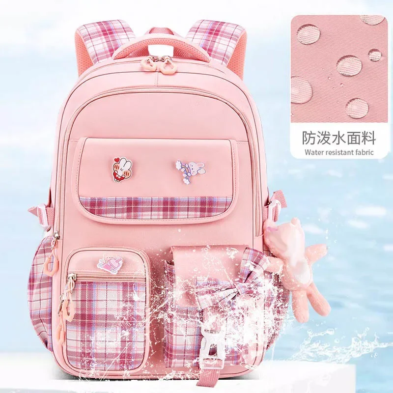 Nova proteção da coluna estudantes da escola primária meninas mochila xadrez com grande capacidade leve à prova dwaterproof água saco das crianças