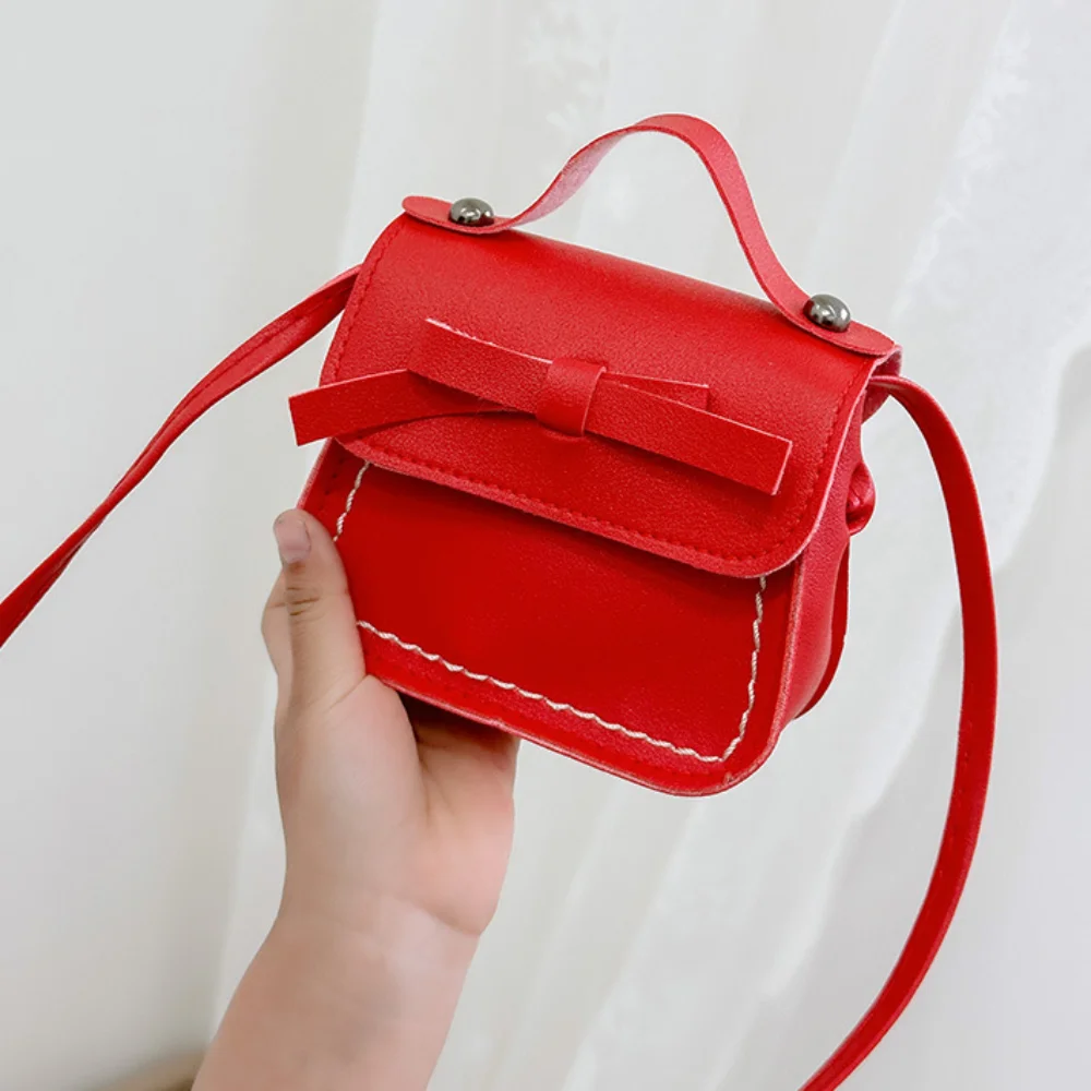 Doce couro do plutônio arco bolsa de ombro cor sólida arco crossbody saco carteira moeda bolsa crianças pequeno saco meninas