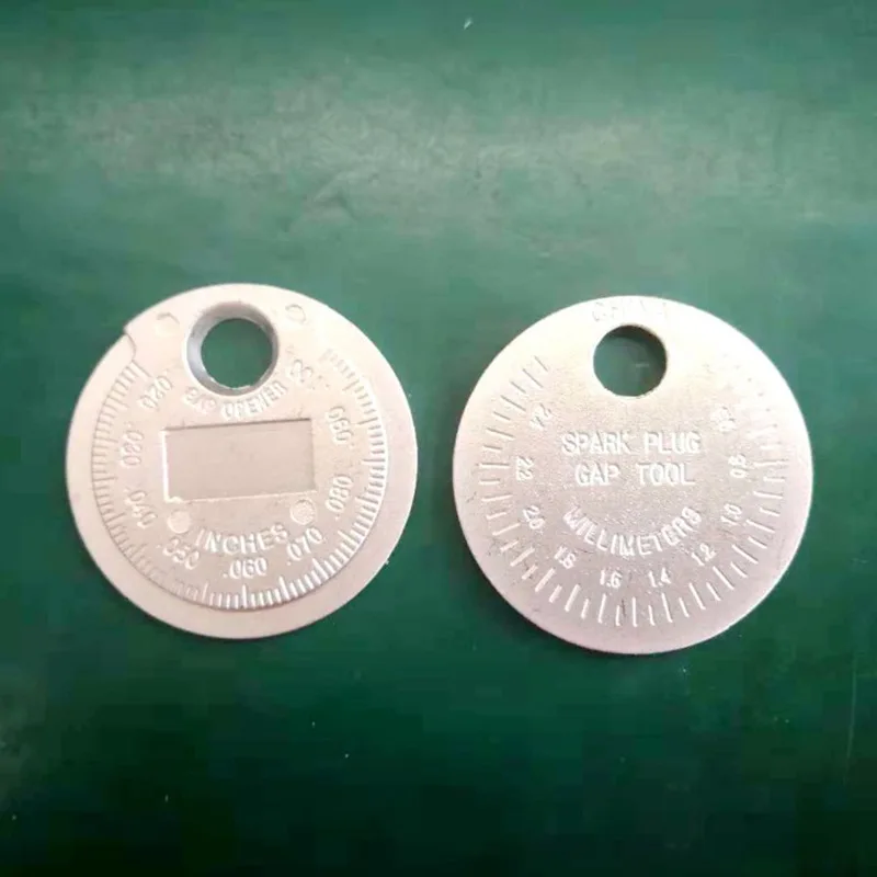 Herramienta de medición de espacio de bujía tipo moneda, rango de 0,6-2,4mm, herramienta de medición de huecos de bujía, 1 ud.