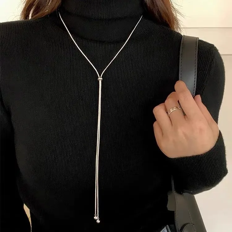 Collar de diseño de cadena de suéter de acero de titanio con borla larga simple