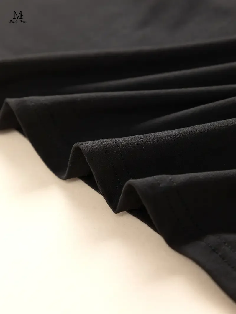 プラスサイズの女性の長袖 Tシャツスパンコールラウンドカラールーズ秋冬服シックなオーバーサイズ黒 Tシャツ女性のための