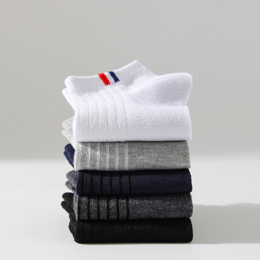 5 paia di calzini da barca da uomo alla moda versatili tinta unita etichetta laterale calzini casual che assorbono il sudore calzini invisibili da uomo d'affari