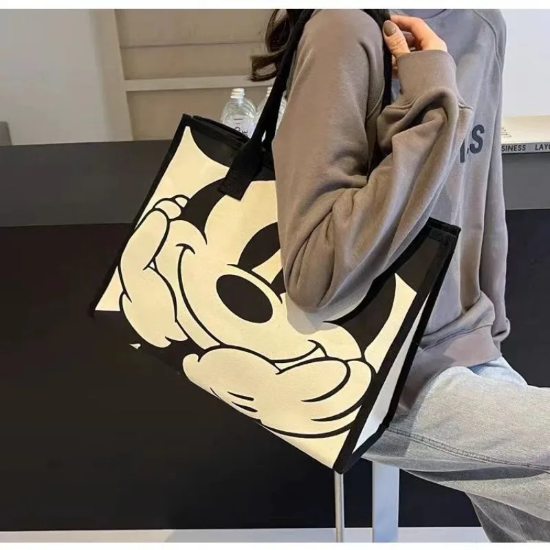 Nuevo bolso de lona de gran capacidad para mujer, informal, versátil, con dibujos animados de Mickey de Disney, bolso de trabajo a la moda para ir al trabajo