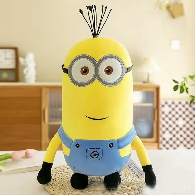 Minions ภาพยนตร์ Periphery สีเหลือง Plush Bob Plush Stuart ตุ๊กตาของเล่นในกางเกงยีนส์ตุ๊กตาหมอนตกแต่งเด็กของขวัญวันเกิด