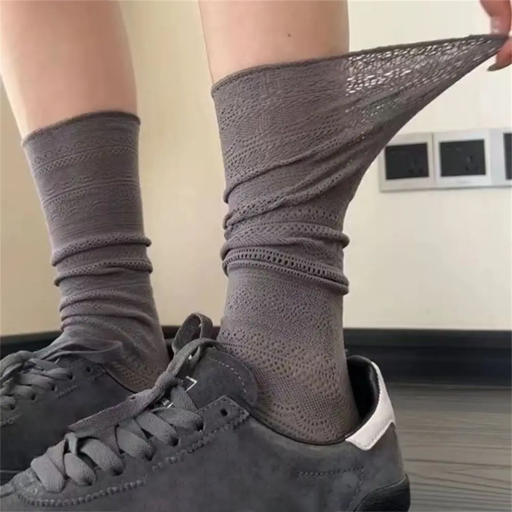 Calcetines de malla ahuecados de Lolita para mujer, medias transparentes de encaje fino, calcetines de seda Retro con flores