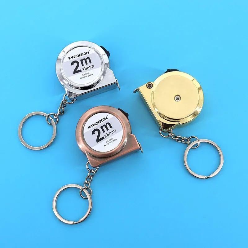 Mini metro a nastro portatile retrattile da 2 m in acciaio dolce con design portachiavi piccolo strumento di misurazione domestico per artigianato e cucito fai-da-te