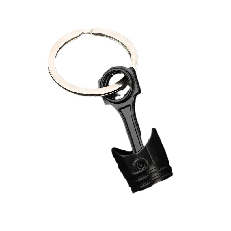 Charmant hommes et femmes voiture sac porte-clés porte-clés en métal en forme de piston de voiture avec pendentif