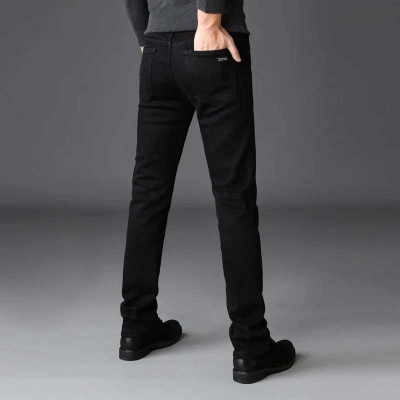 Primavera outono homens clássico marca de moda jeans homme homem estiramento macio preto motociclista masculino calças jeans dos homens macacão