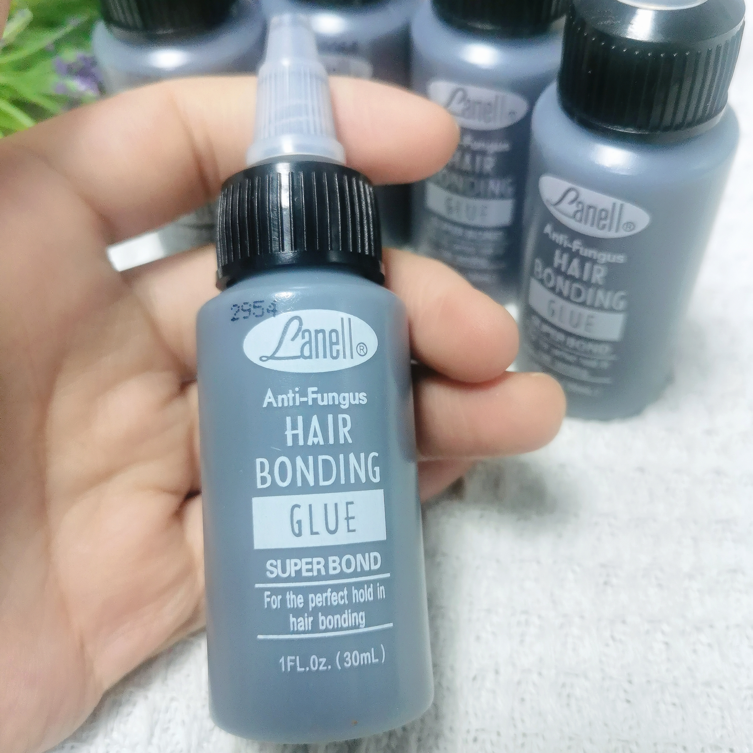 1 Fles 1 Oz 30 Ml Lanell Zwart Haar Weven Bond Anti-Schimmel Haarbinding Lijm Super Binding Voor De Perfecte Grip In Hechting