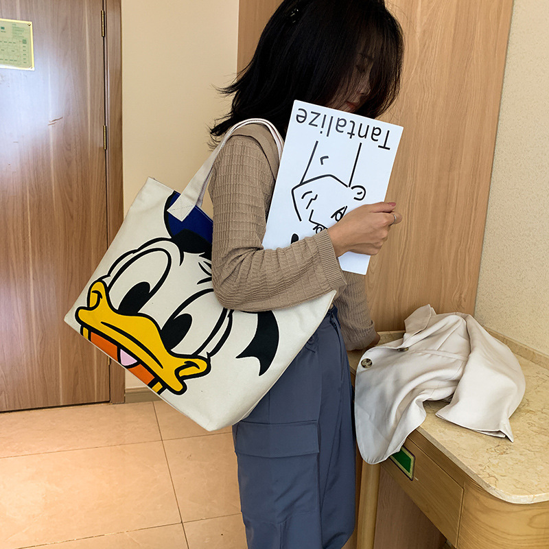 Disney Cartoon Mickey Damen Handtasche Student Mode Leinwand Umhängetasche Donald Duck Große Kapazität Einkaufstasche
