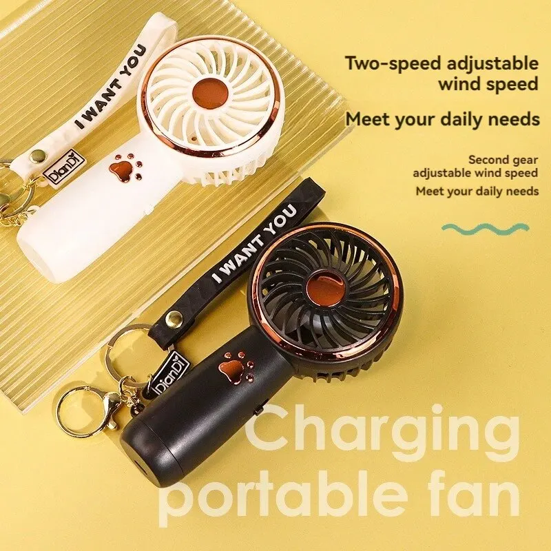 2024 ฤดูร้อนใหม่พัดลมมินิน่ารักการ์ตูนแบบพกพาชาร์จ USB พัดลมมือถือนักเรียนพัดลมกลางแจ้ง