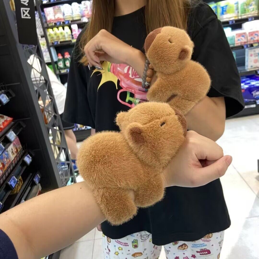 1-10PCS Kapibara 봉제 인형 Kapi Bara 물 돌고래 인형 인형 인형 손목 스냅 링 장난감 플러시 장난감의 손에 누워