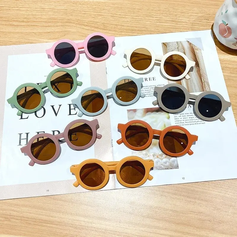 Gafas de sol con montura redonda para bebé, lentes de Color caramelo, protección UV de Color sólido, redondas y cómodas, estilo Retro, novedad