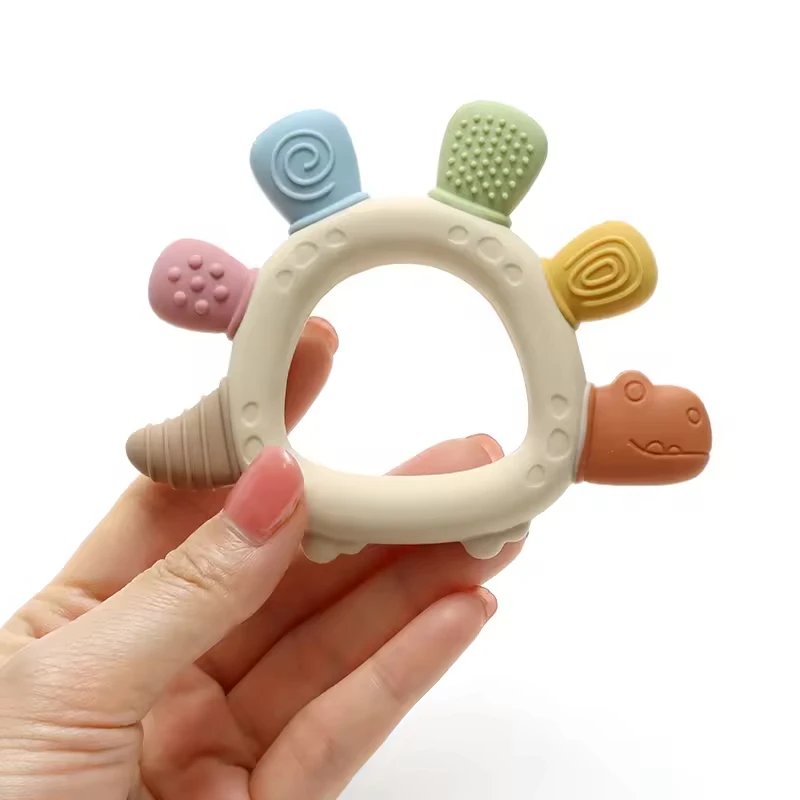 เด็กไดโนเสาร์ซิลิโคนTeethingของเล่นBPAฟรีง่ายต่อการจับทารกCare Teether Chewingของเล่นสําหรับทารกแรกเกิดของขวัญทารกอุปกรณ์เสริม