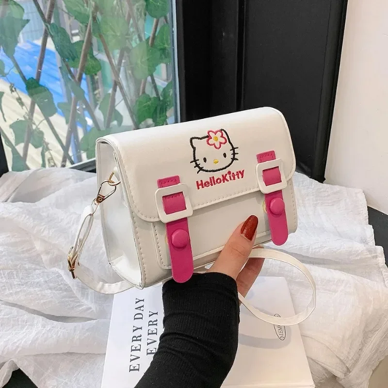 Sanrio กระเป๋าสี่เหลี่ยม PU กระเป๋าคนส่งเอกสารอนิเมะกระเป๋าสะพายไหล่น่ารักกระเป๋าเป้ลายการ์ตูนน่ารักกระเป๋าแฟชั่นของฉันลายเมสเซนเจอร์ cinnamorol Kuromi