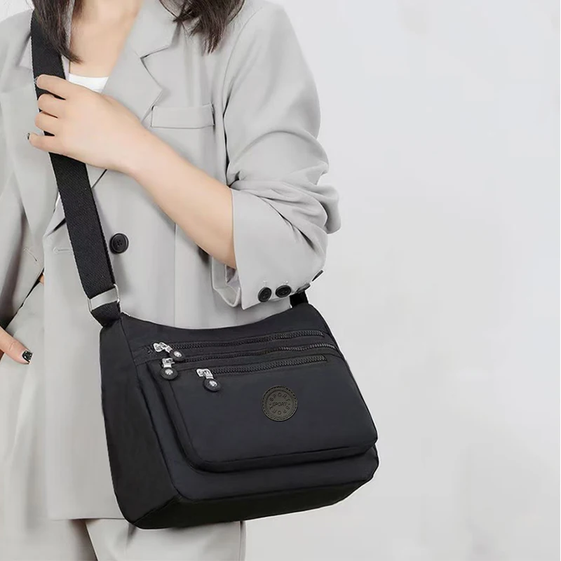 Nova bolsa de ombro de nylon para festa neutra para homens e mulheres, bolsa feminina de lona elegante e casual