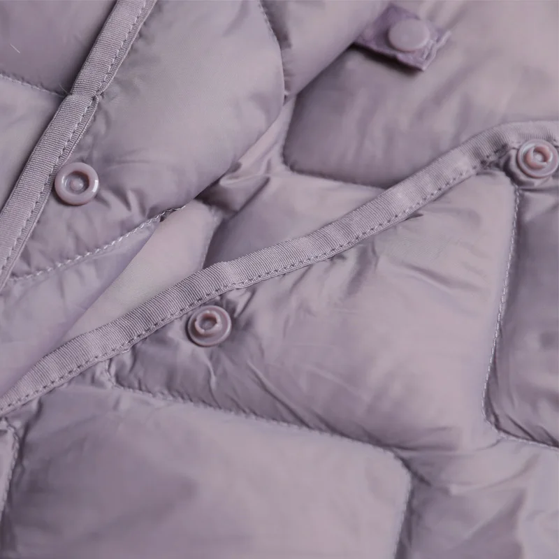 Chaleco de plumón de pato blanco ultraligero para mujer, parka cálida sin mangas, estilo coreano, novedad de 2024