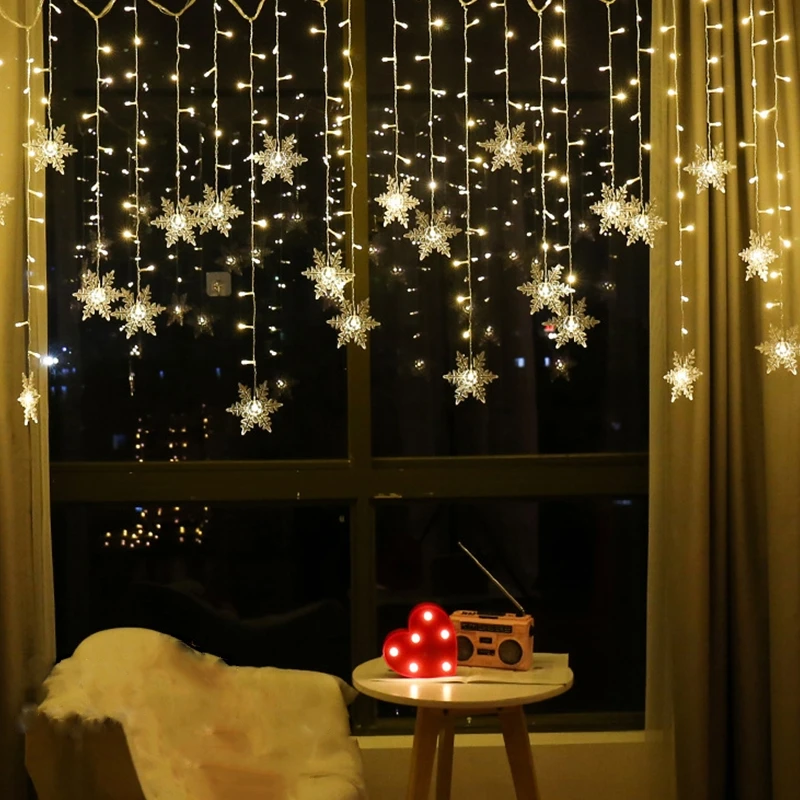 คริสต์มาสไฟตกแต่งกลางแจ้งแขวนไฟ LED เกล็ดหิมะ Curtain String Lights ปาร์ตี้ตกแต่งชายคาสวน.