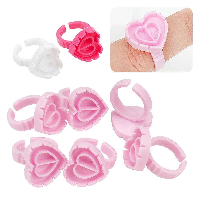 100 Uds. Soporte de anillo de pegamento para pestañas desechable, taza de plástico en forma de corazón, soporte para pigmento de tatuaje, paleta, extensión de pestañas, herramienta de maquillaje