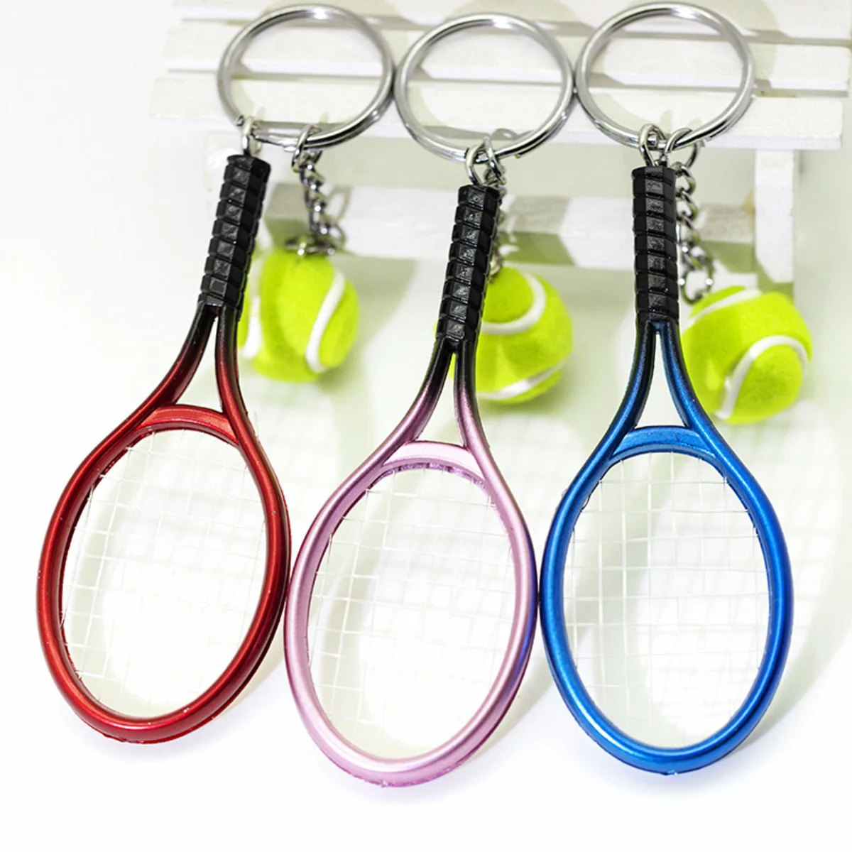 Tennisracket sleutelhanger cadeau - miniatuur realistische sport sleutelhanger, ideaal souvenir voor coaches en spelers, klein maar betekenisvol