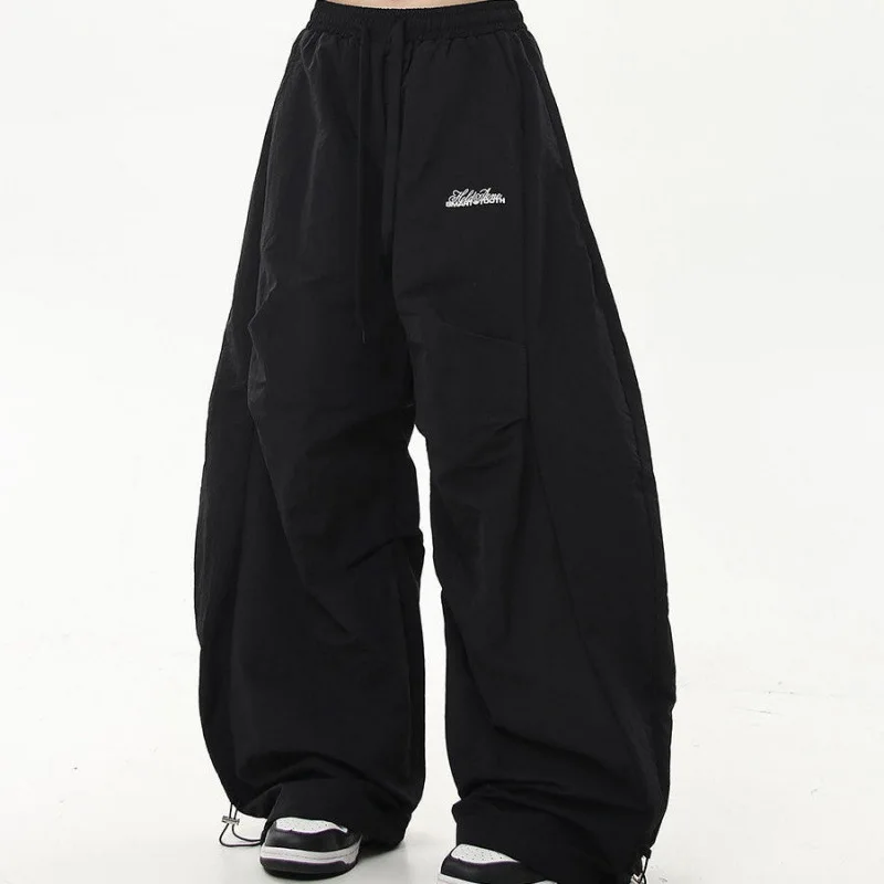 Calças de trabalho de rua retrô hip-hop americanas com uma sensação sofisticada, guarda-chuva plissado, roupa de trabalho militar, calça com cordão de cintura alta