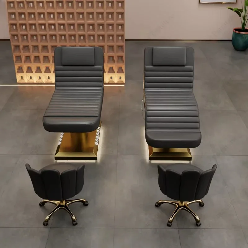Letto di bellezza elettrico per salone di bellezza di lusso di vendita calda Letto per ciglia nere con base in acciaio inossidabile dorato a 3 motori in vendita