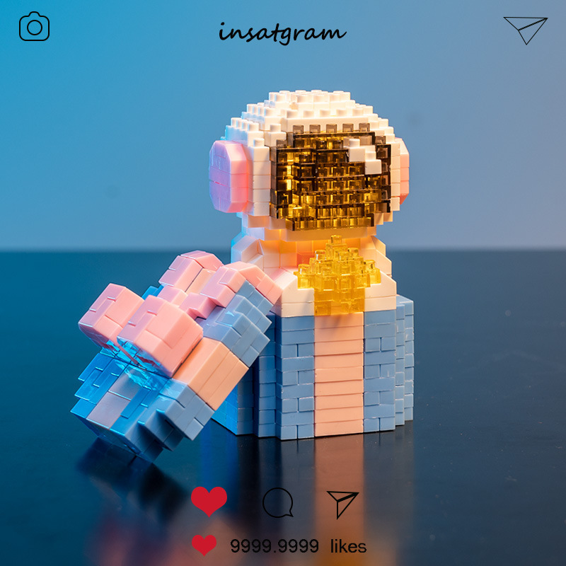 Blocs de construction à micro particules, espace créatif aérospatial brillant, figurine d'astronaute avec lumière, ensemble de briques à monter soi-même, jouets pour enfants, cadeau