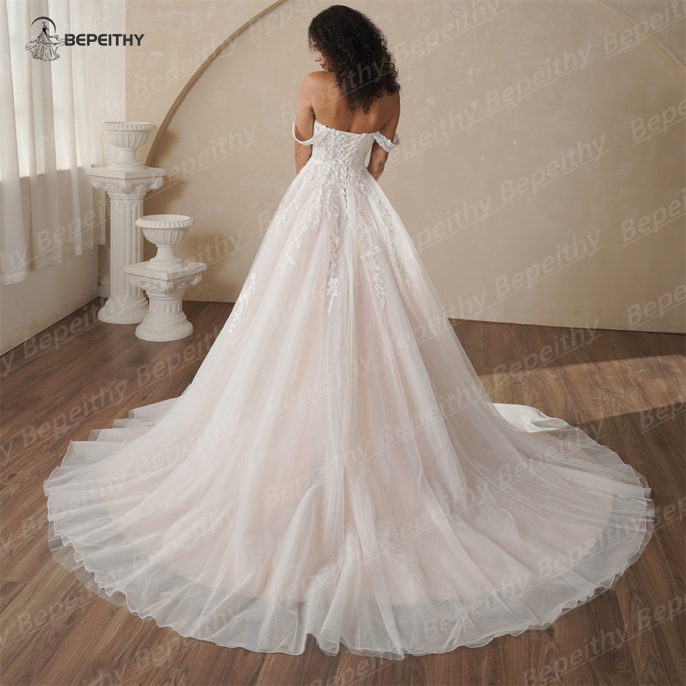 BEPEITHY 맞춤형 Strapless 라인 레이스 웨딩 드레스 2025 봄 민소매 Boho 샴페인 아이보리 신부 비치 신부 가운