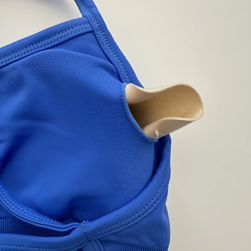 Sujetador deportivo dinámico con espalda descubierta para mujer, sujetador de encaje perfecto, Top acolchado para Yoga, Top corto elástico de soporte medio para gimnasio