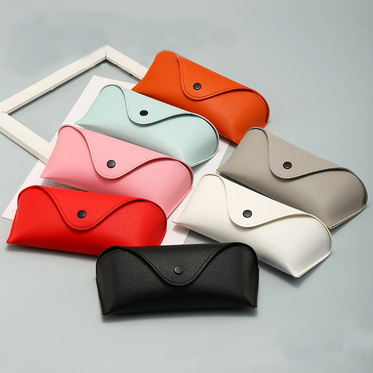 Estuche de cuero portátil para gafas, bolsa para gafas de sol suave y duradera de cuero PU, funda delgada para mujer, estuche para gafas Unisex, 1 ud.