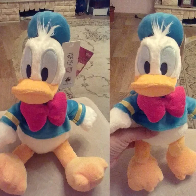 MINISO Donald Duck และ Daisy Plush ของเล่นร้อนตุ๊กตาสัตว์ของเล่นตุ๊กตาผ้าฝ้าย PP ตุ๊กตาวันเกิดคริสต์มาสปีใหม่นําเสนอสําหรับเด็ก