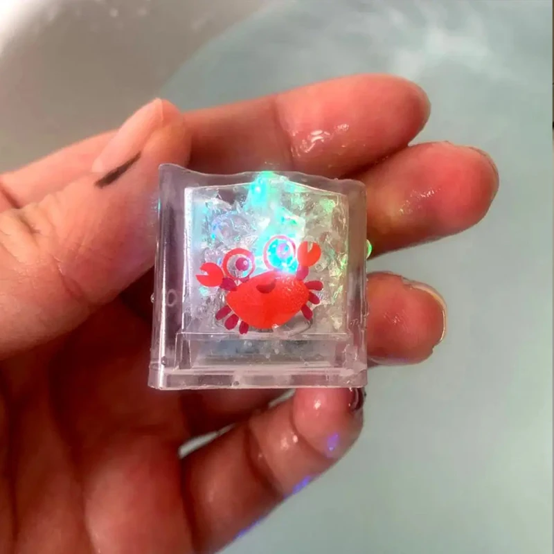 8PCS การ์ตูนสัตว์ทะเล Luminous ICE CUBE Bath ของเล่น LED สีสันสดใสของเล่น Touch Sensitive ของเล่นส่องสว่าง