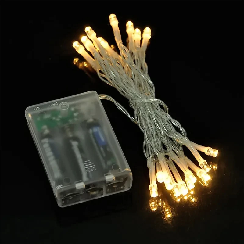 ไฟ LED String 3 * AA แบตเตอรี่ดําเนินการกันน้ํา Fairy ไฟ LED คริสต์มาสสําหรับปาร์ตี้วันหยุดงานแต่งงาน 20M 10M 5M 2M