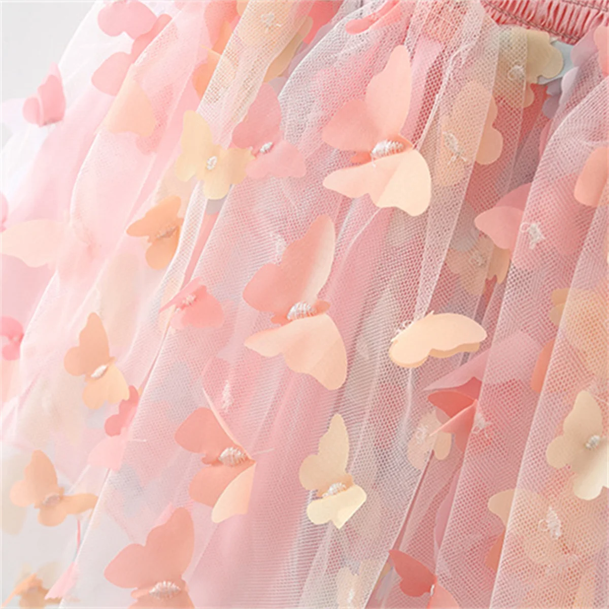 Abito a canotta da ragazza estiva con gonna soffice senza maniche con ali di farfalla patchwork in rete con stampa di farfalle arcobaleno