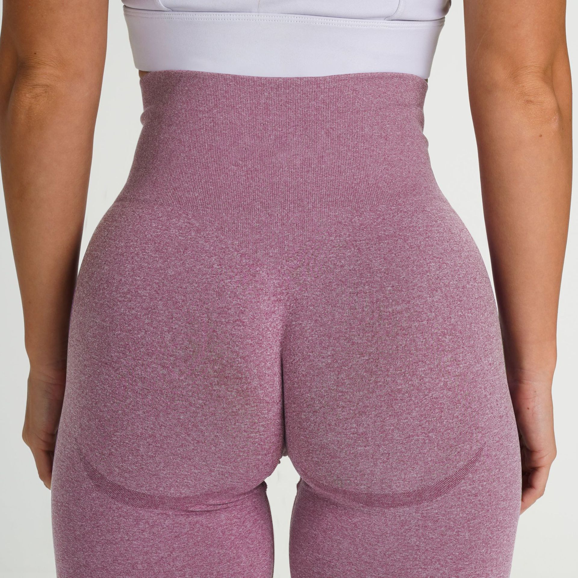 Hochelastische Lächeln-Yogahosen, nahtlose europäische und amerikanische Fitnesshosen, enge Yogahosen, hohe Taille und hüfthebende Training