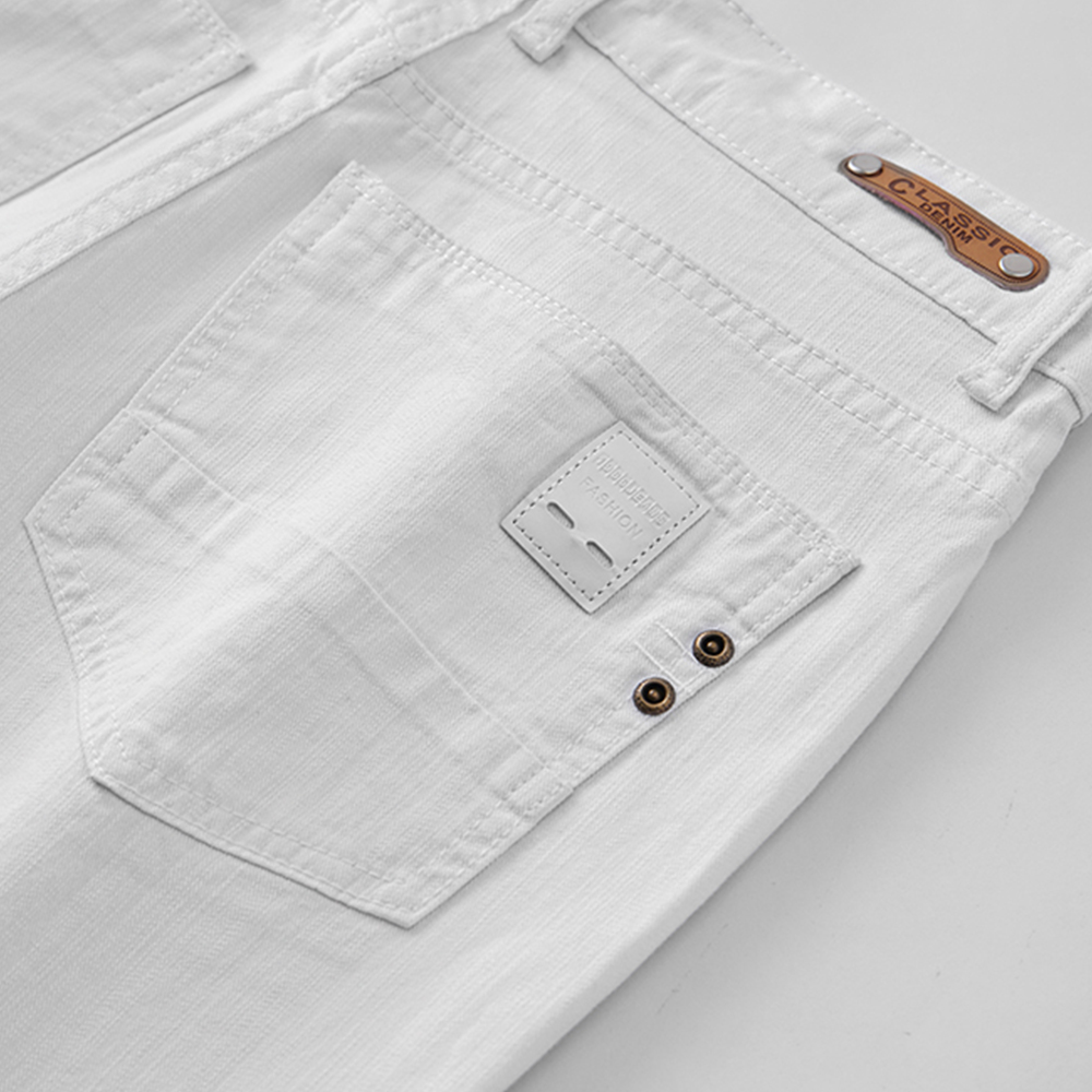 Męskie Białe Jeansy Elastyczne Proste Slim Fit Casual Miękkie Biznesowe Klasyczne Markowe Spodnie Modne Zaawansowane Elastyczne Spodnie Denimowe