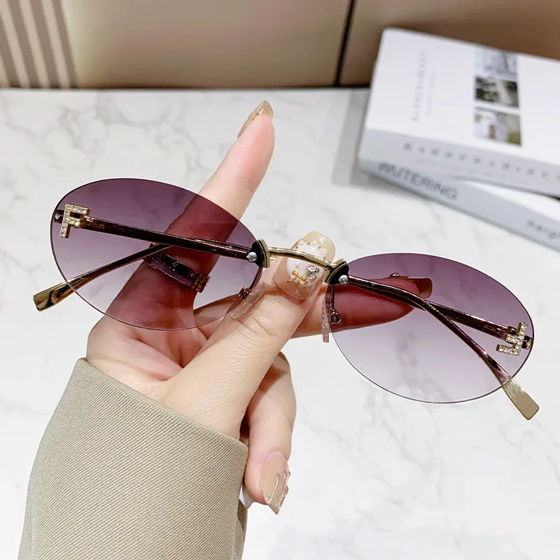 ยุโรปและอเมริกาแฟชั่นแว่นตากันแดดโลหะ Frameless