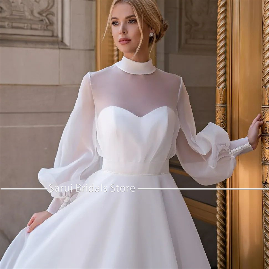 Abito da sposa personalizzato con collo alto trasparente a maniche lunghe in organza di vendita calda con abito con fiocco per abiti da sposa blancos de mujer