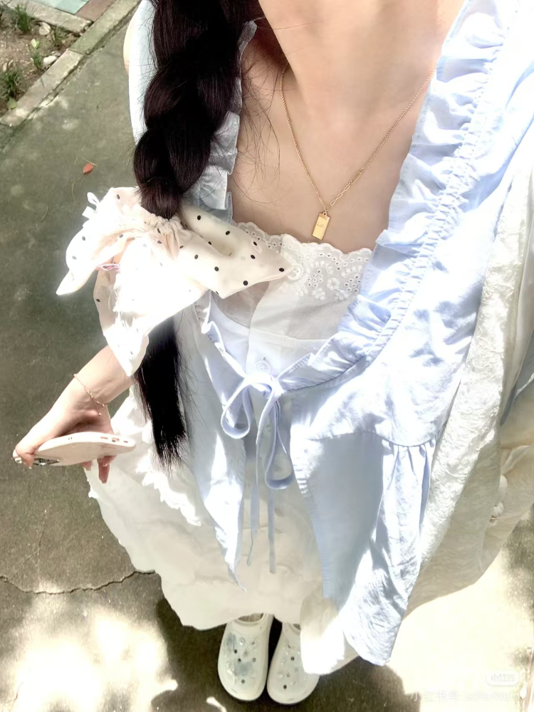 夏の韓国のファッションルーズノースリーブトップス女性甘いカジュアルレースアップ固体 V ネックシフォントップ女性のシックな薄いフリルブラウス