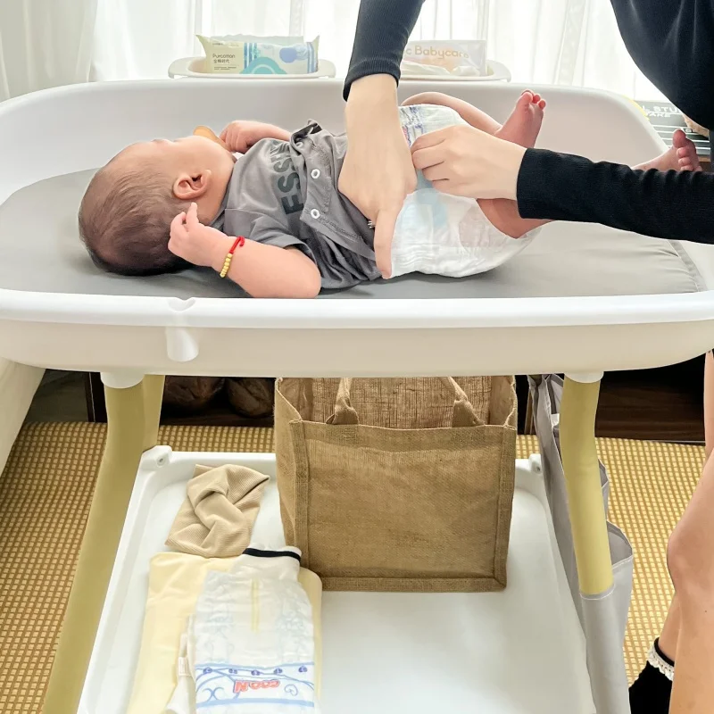 6-12 months newborn changing table Multi-functional baby high and low adjustable nursing table Baby bath table
