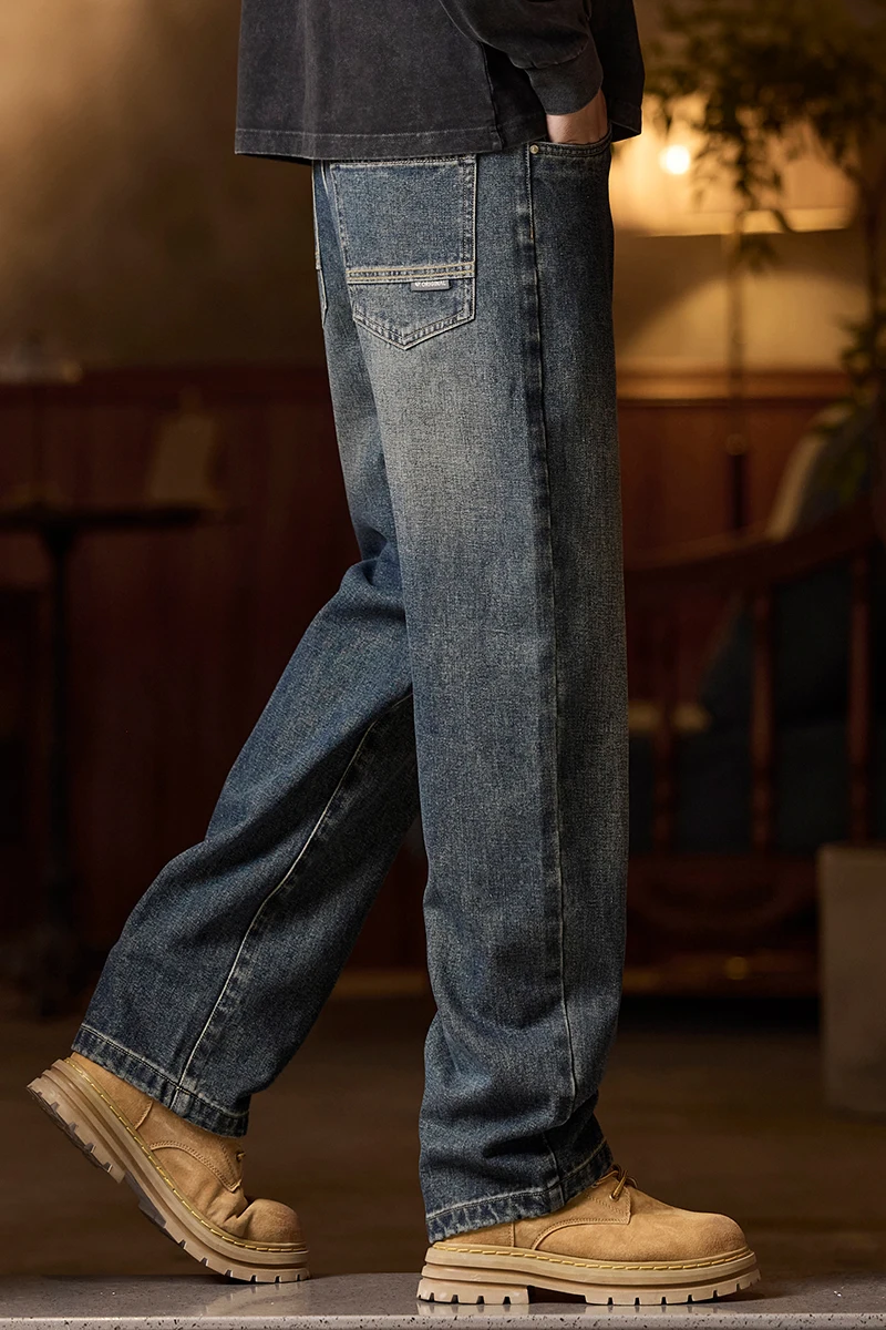 Vaqueros de cintura elástica para hombre Vaqueros azules de corte relajado con cintura elástica con cremallera y botón