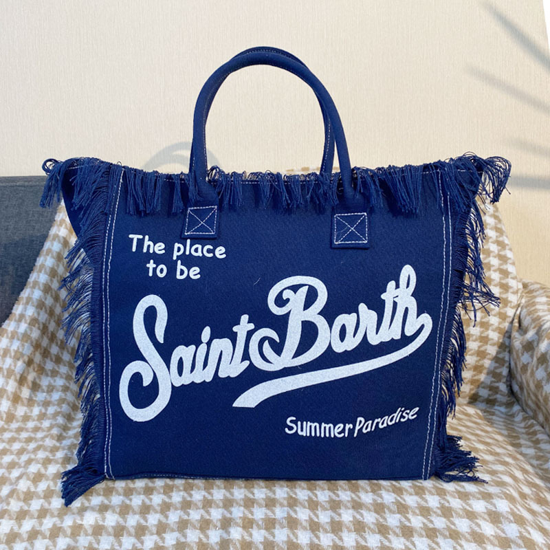 Bolso de mano de playa de gran capacidad con borlas a la moda, nuevo bolso de mujer de un solo hombro con letras con estampado de leopardo