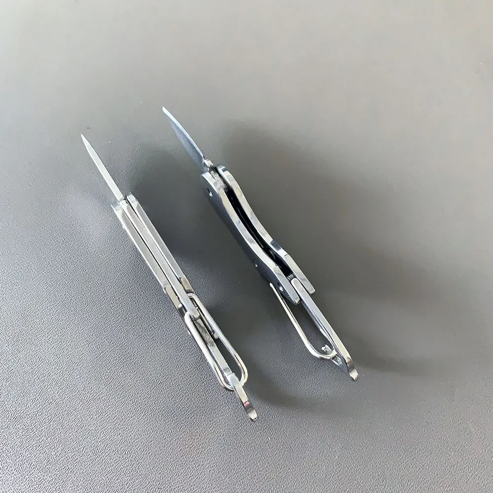 Mini cuchillo plegable de acero inoxidable para acampar al aire libre, llavero de bolsillo portátil EDC, cuchillos multiherramientas con hebilla