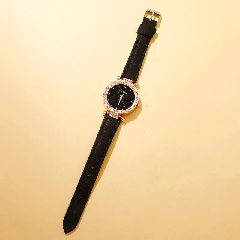 Reloj de pulsera de cuarzo con esfera redonda de cielo estrellado simple para mujer