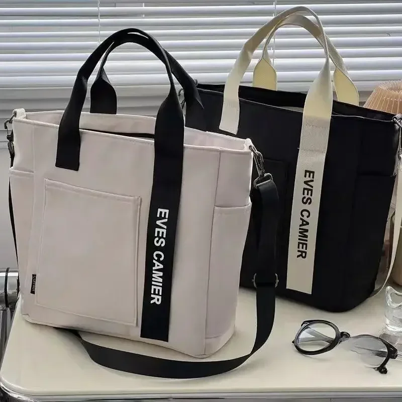 Nieuwe Casual Tote Schoudertas met grote capaciteit Nylon Waterdichte canvas handtas Eenvoudige mode Messenger Bags voor schoolmeisje