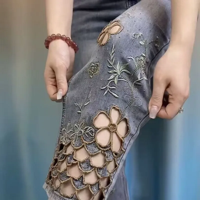 women High end hollowed out embroidered denim eight cigarette tube pants 2025 new summer thin high waist stylish denim tube pant