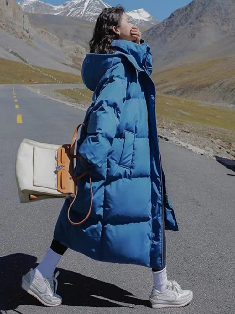 Longo engrossado para baixo algodão pão estilo casaco feminino inverno 2025 outerwear coreano solto longo na altura do joelho sólido jaqueta com capuz