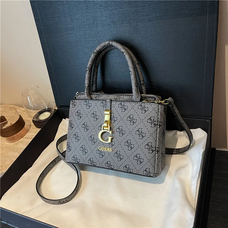 Bolsa mensageiro elegante para mulheres viajantes com estilo vintage de grande capacidade e logotipo de letra simples e elegante